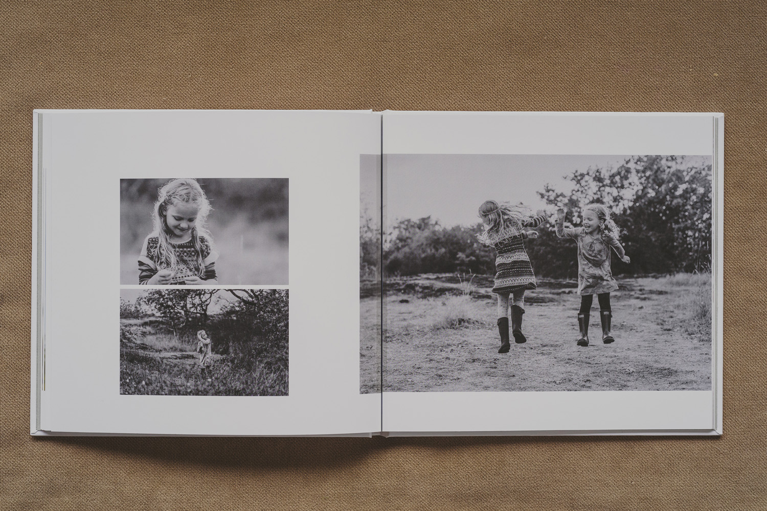 beautiful family photo book-2 young girls jumping & laughing