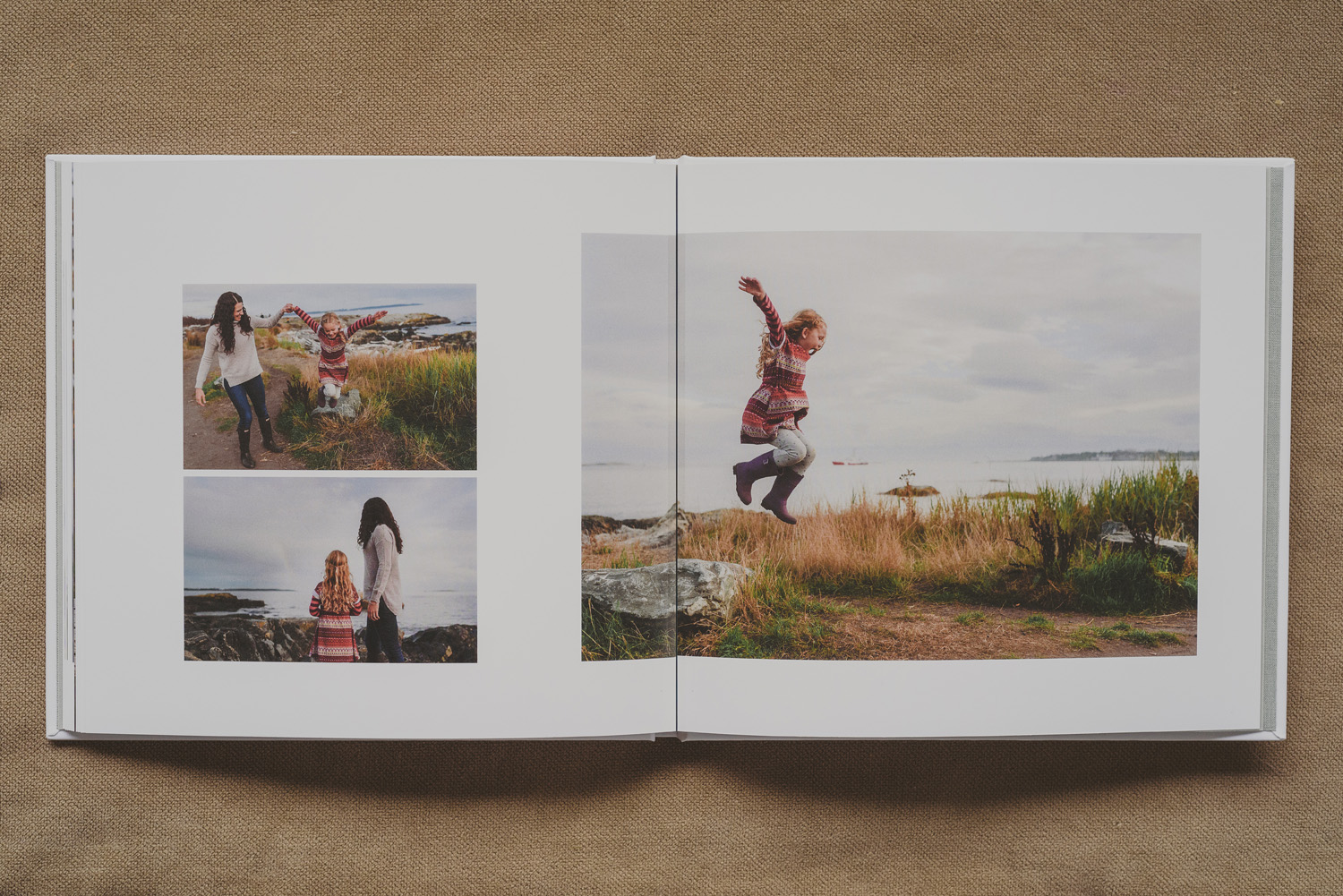 beautiful family photo book-young girl jumping by the beach & snuggling mom