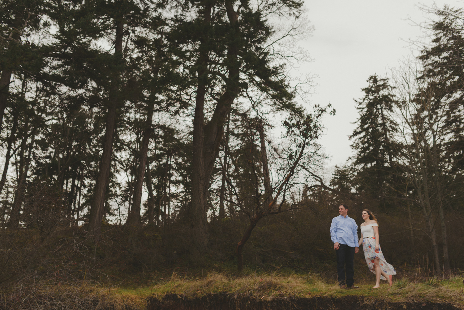 vancouver-island-bc-engagement-couple in front of a forest