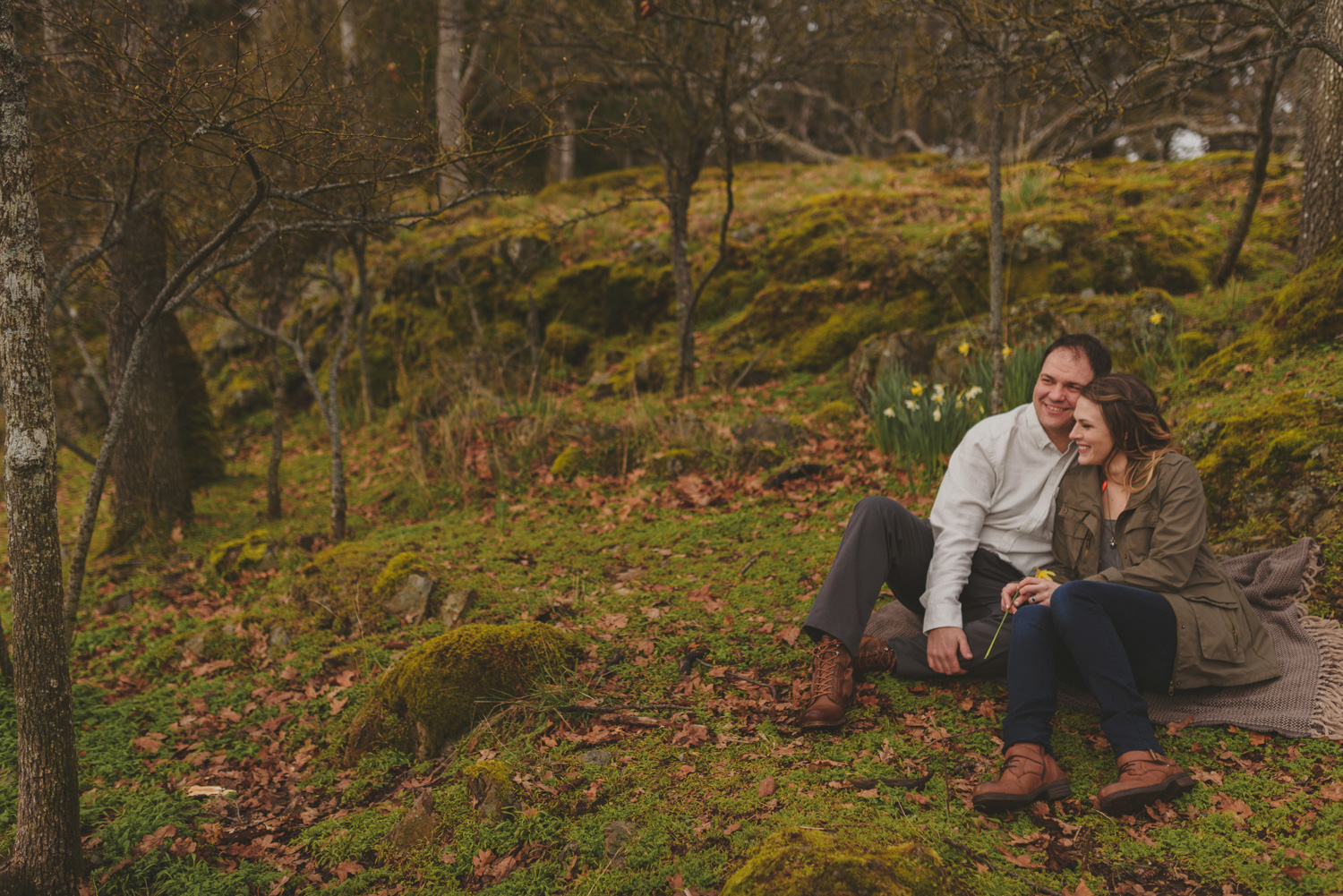 vancouver-island-bc-engagement-couple kissing in a mossy grove