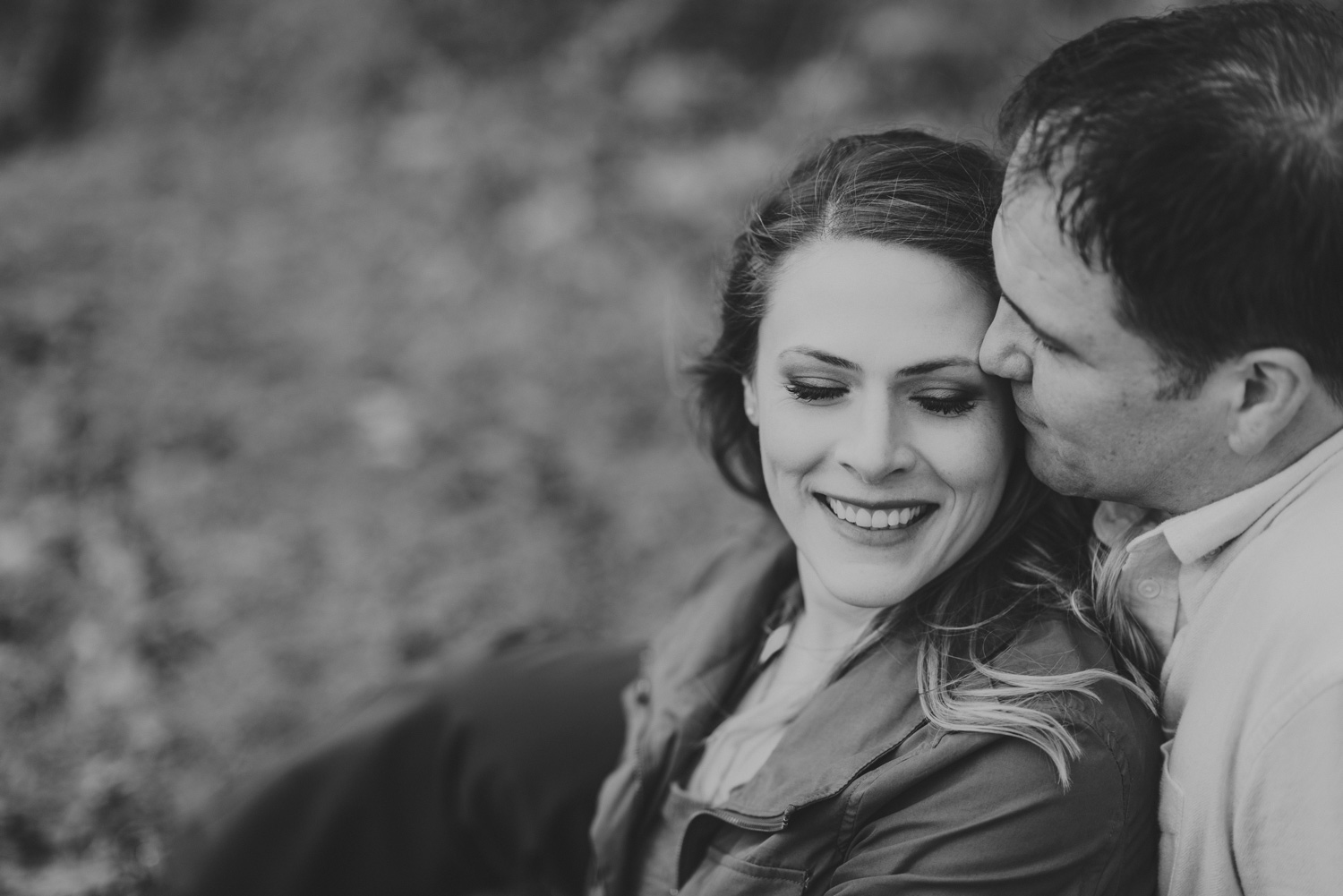 vancouver-island-bc-engagement-man kissing a woman’s cheek tenderly