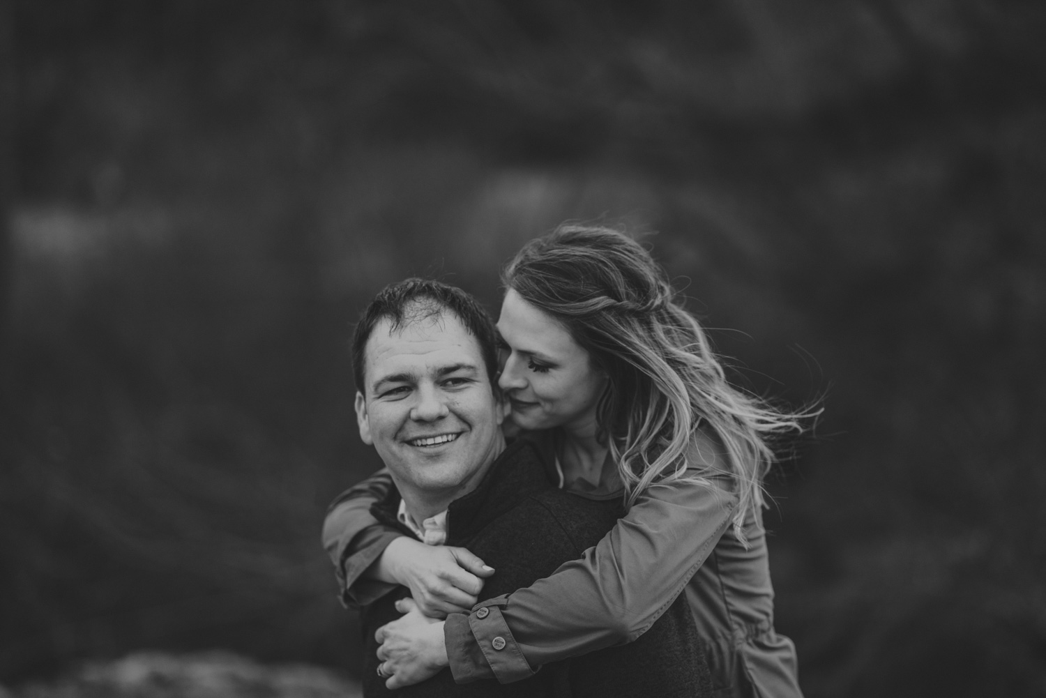 vancouver-island-bc-engagement-couple laughing & embracing