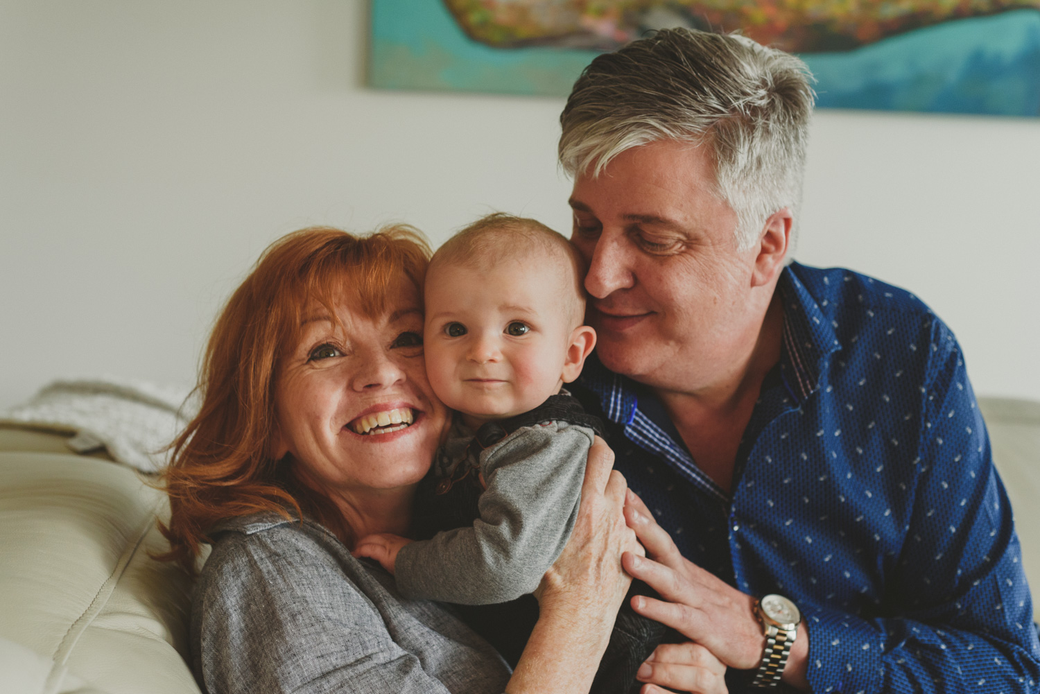 comox bc lifestyle family photography-candid portrait of grandma, grandpa & baby in home