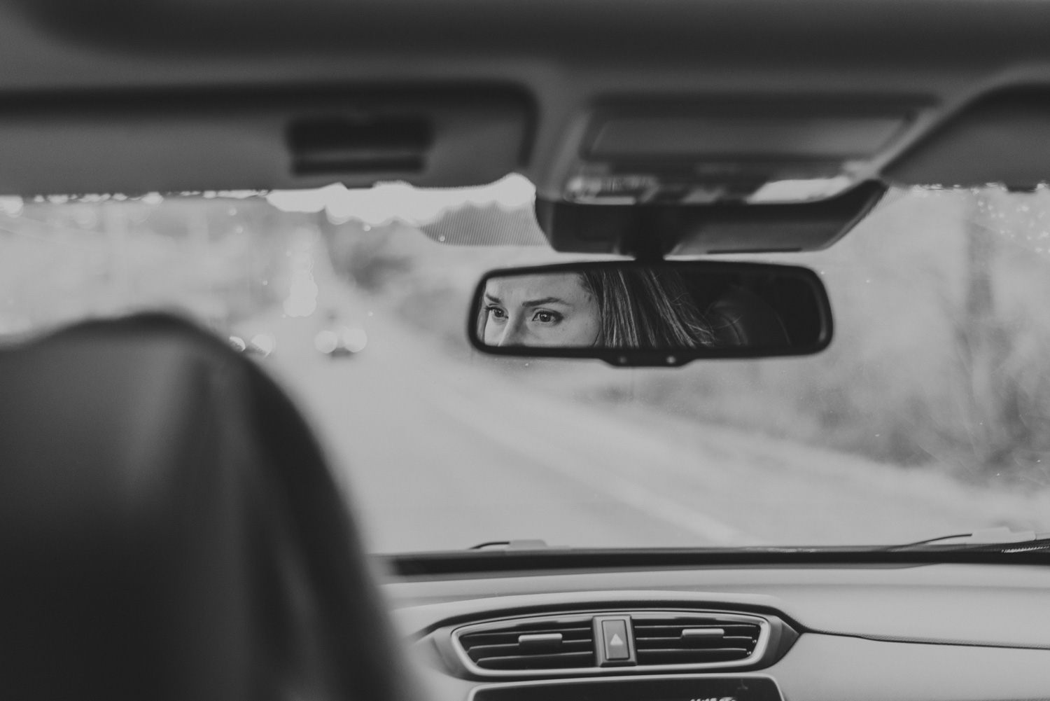 comox bc lifestyle family photography-woman driving eyes in rear view mirror