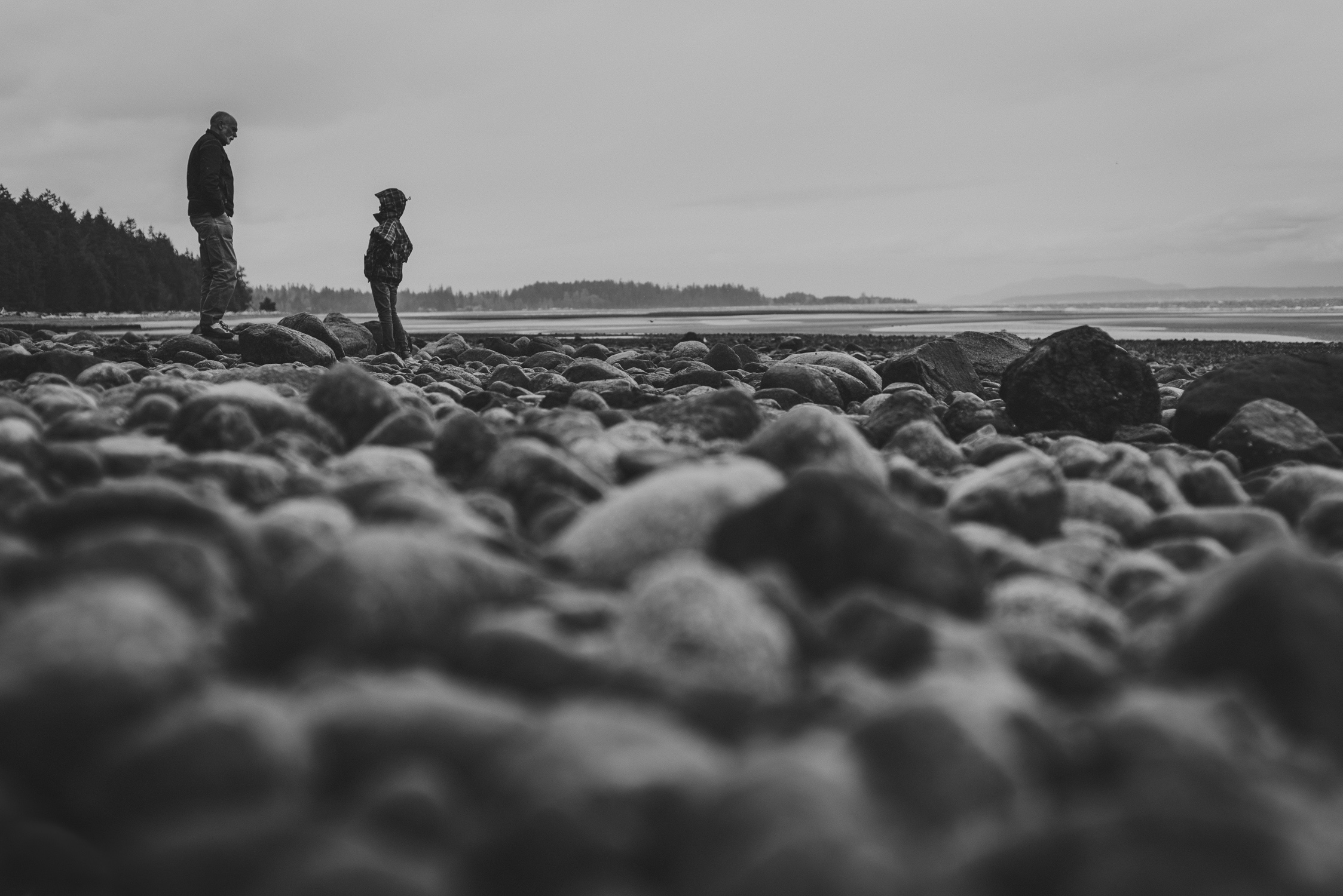 family travels - campbell river-father & daughter on beach-multi-racial family