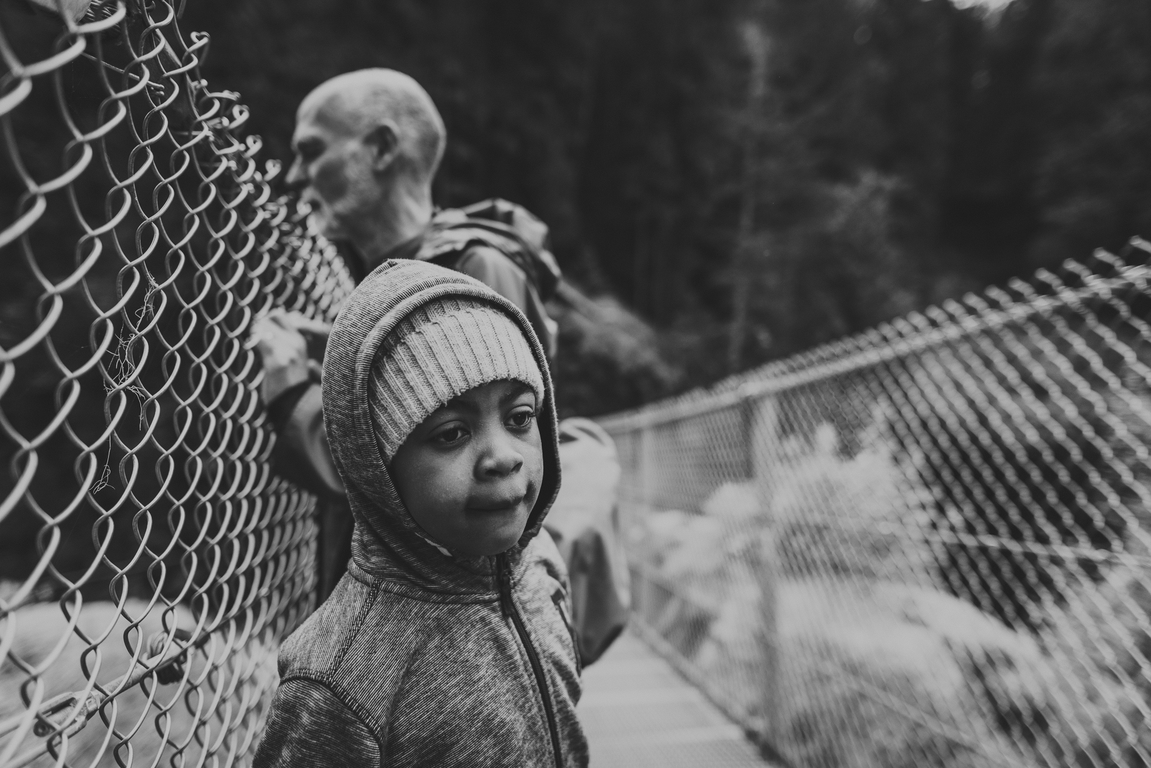 family travels - campbell river-father & kid on suspension bridge