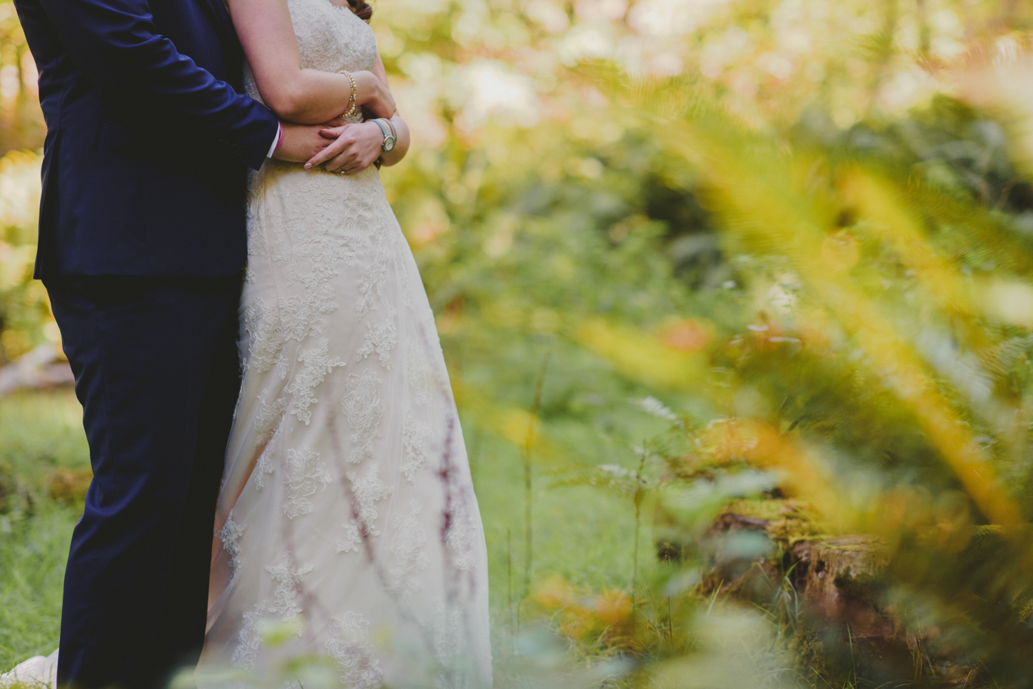 detail of bride & groom hugging at bodega ridge galiano island