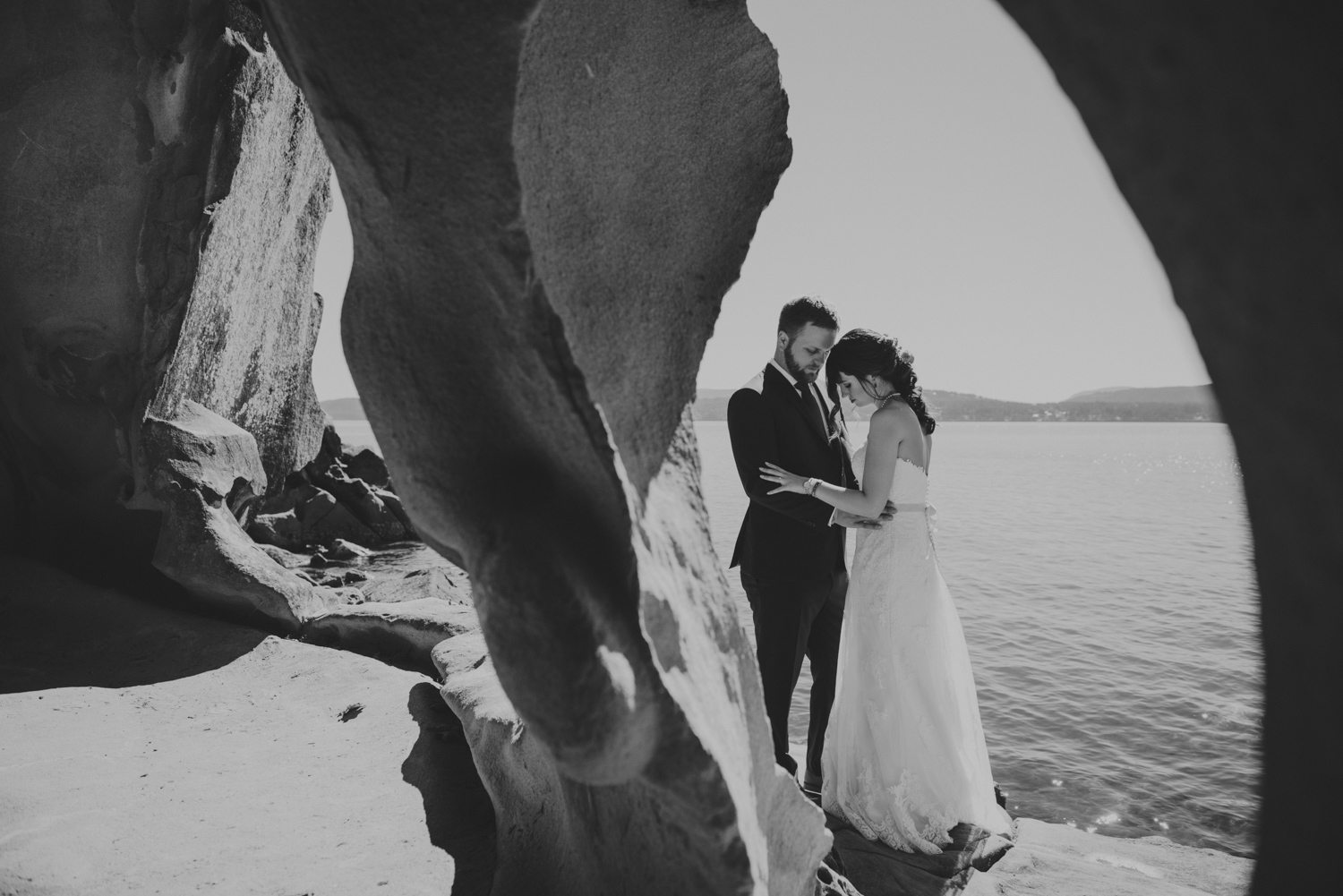 bride & groom by sandstone rocks at bodega ridge galiano island