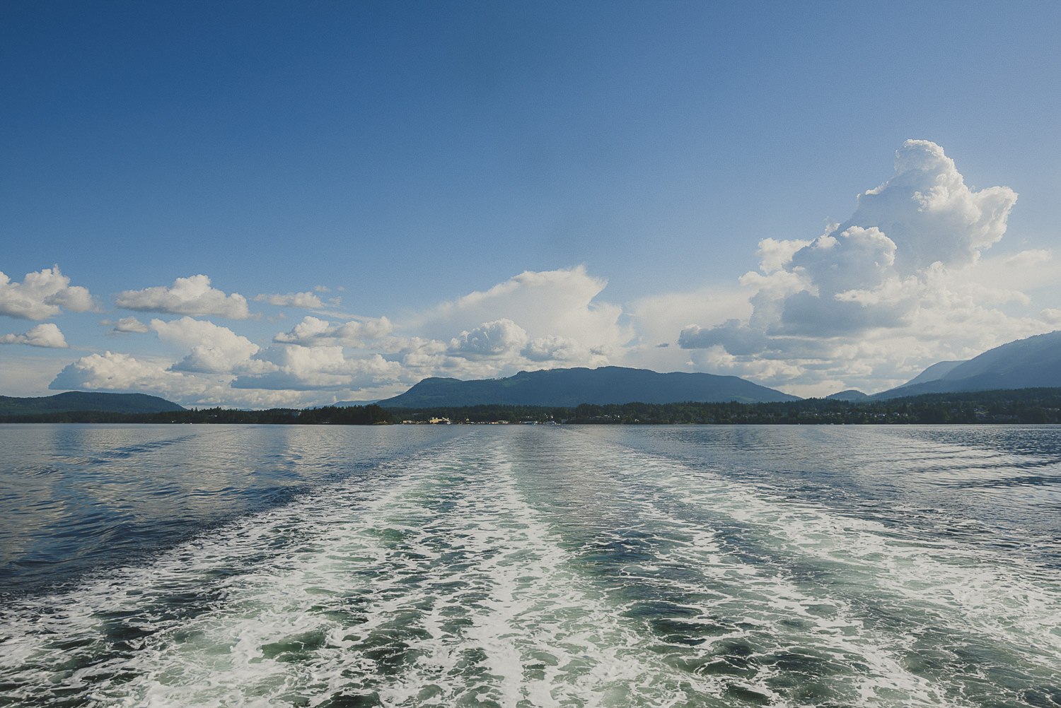 wake of a ferry on a sunny day - overbury resort thetis island wedding - 