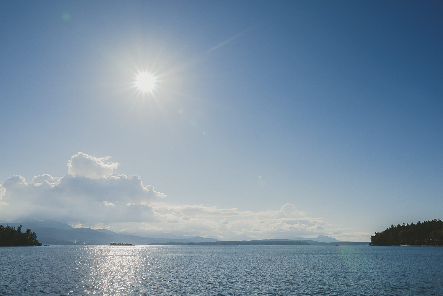 sunshine over the ocean - overbury resort thetis island wedding - 