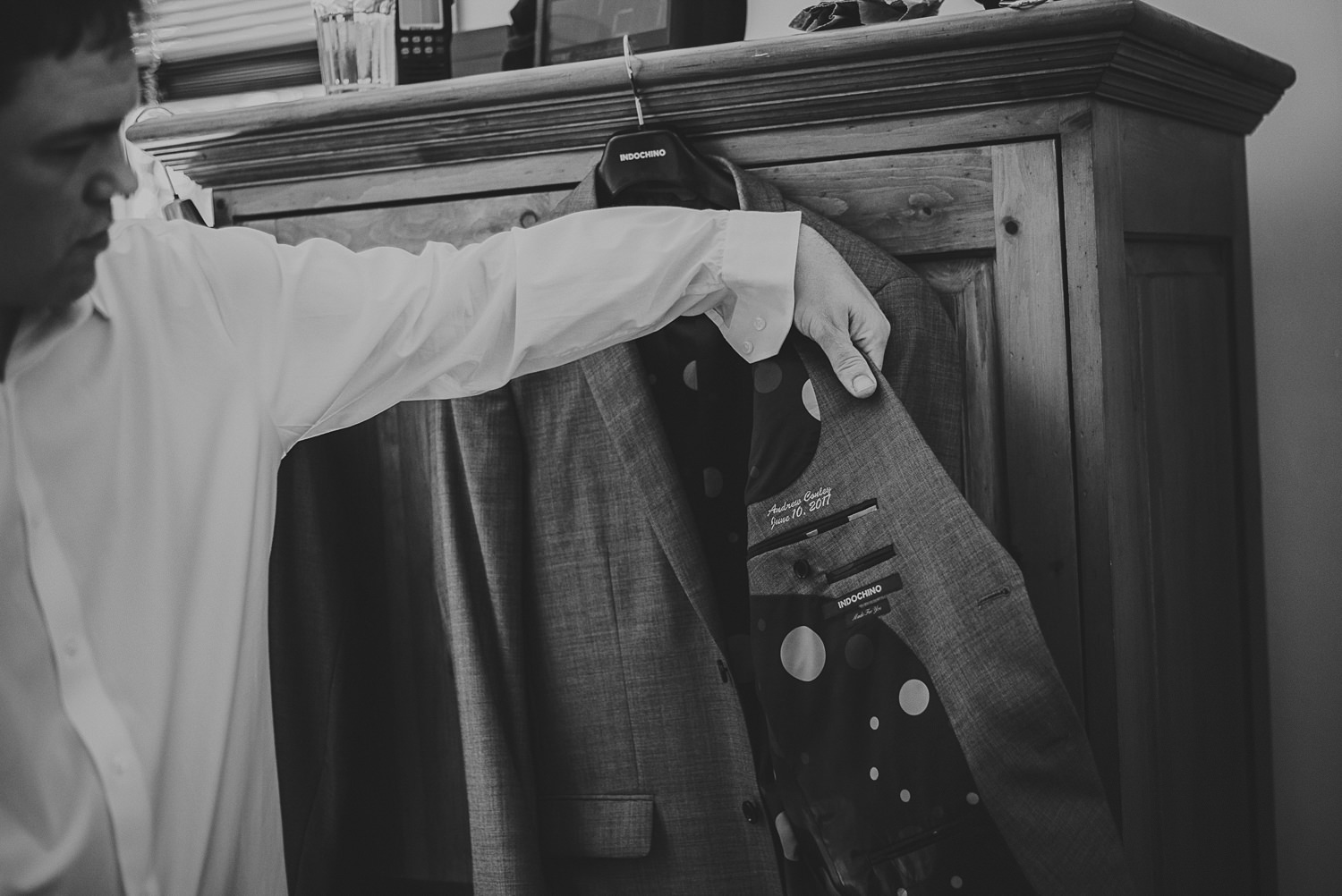 groom’s suit at overbury resort thetis island wedding - 