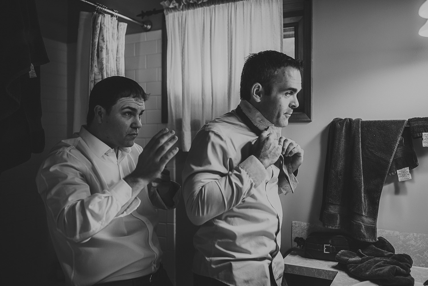 groom & friend getting ready at overbury resort thetis island wedding - 