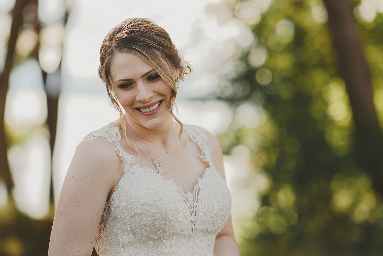 bride laughing at overbury resort thetis island wedding 