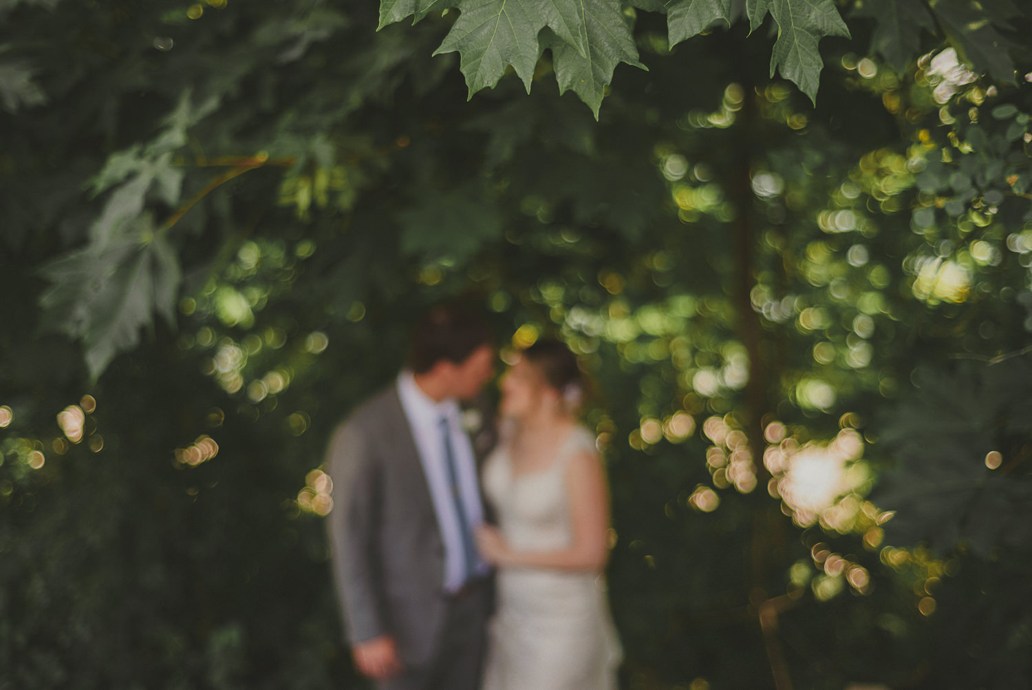 blurry photo of bride & groom at overbury resort thetis island wedding 