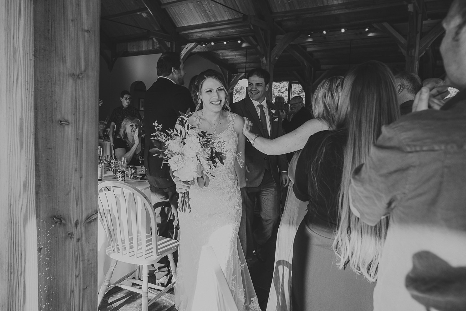 bride & groom entering reception at overbury resort thetis island wedding 