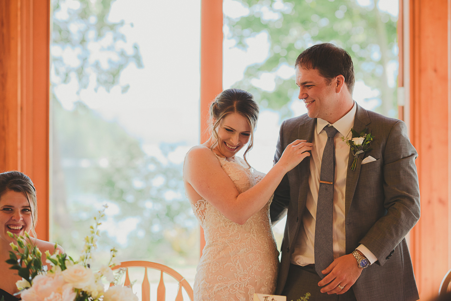 bride & groom laughing at overbury resort thetis island wedding 