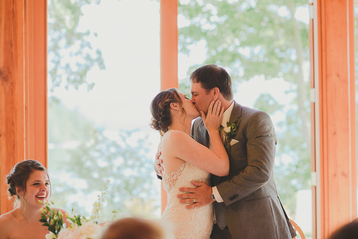 bride & groom kissing at overbury resort thetis island wedding 