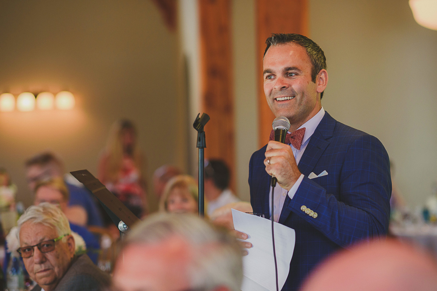 man giving speech at overbury resort thetis island wedding 