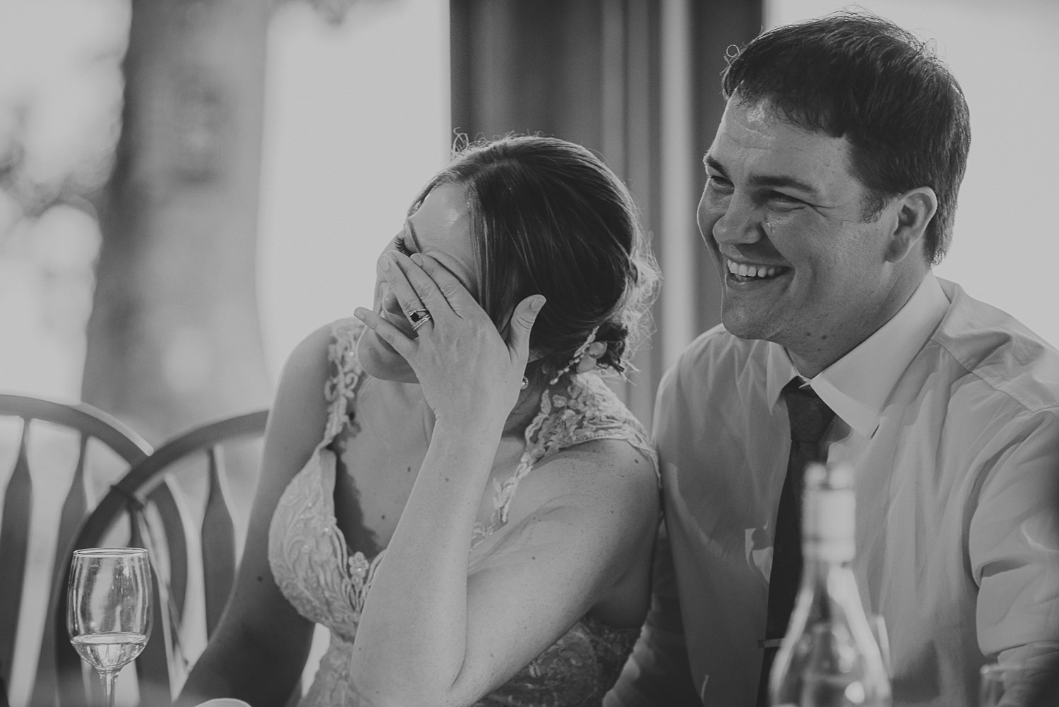 bride & groom laughing at overbury resort thetis island wedding 