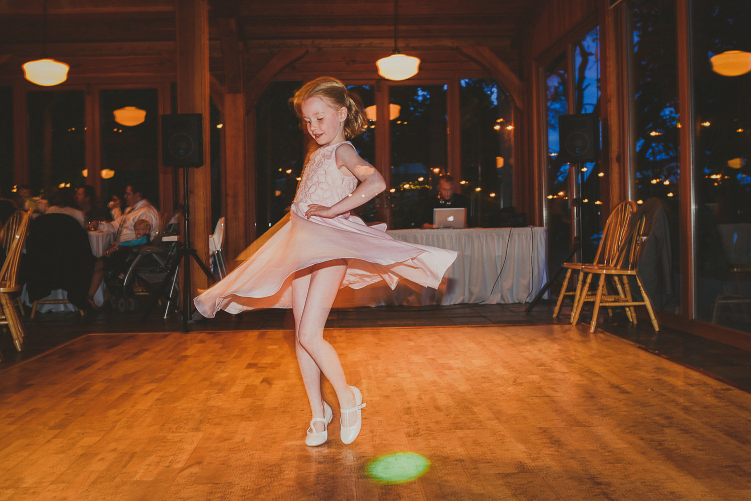 girl twirling dress at overbury resort thetis island wedding 