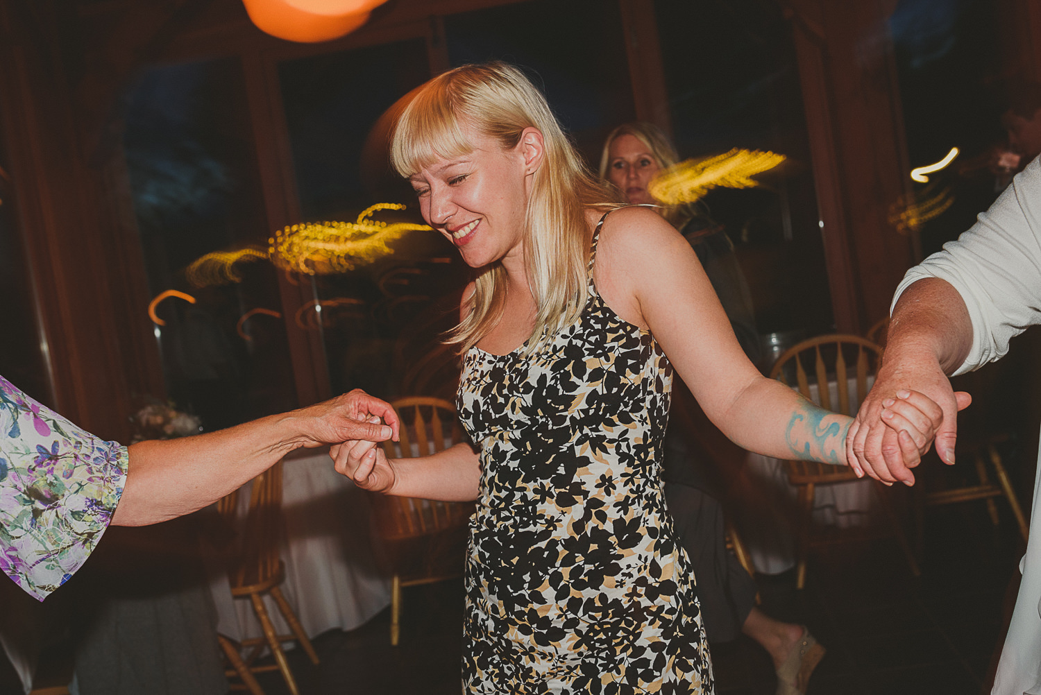 woman dancing at overbury resort thetis island wedding 