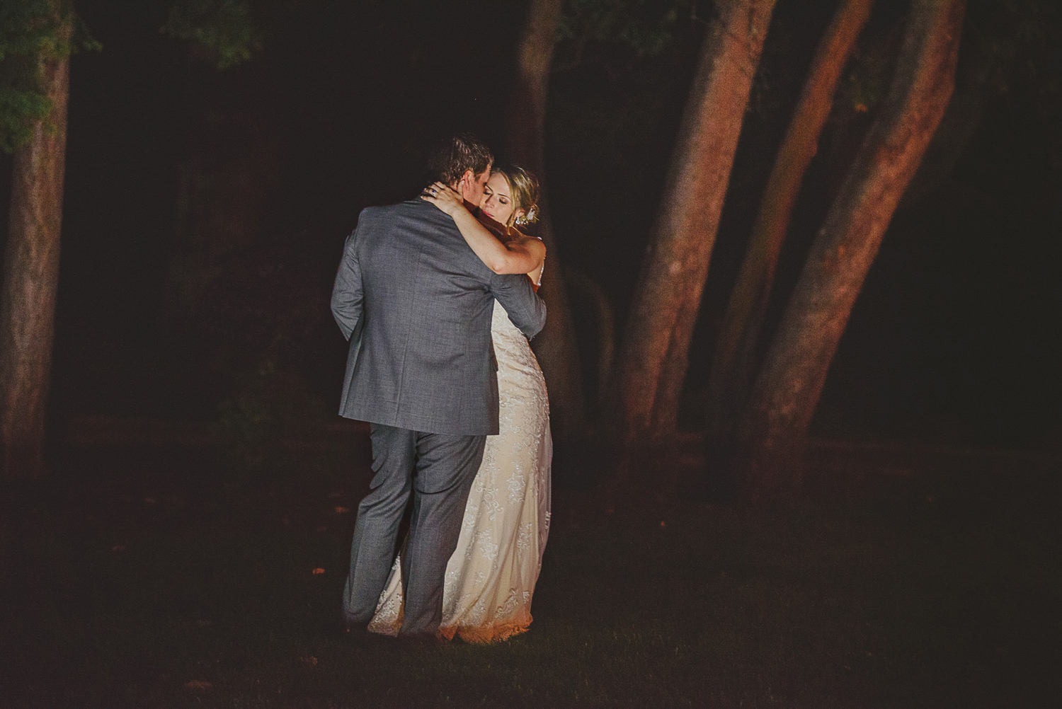 bride & groom dancing under trees late at night at overbury resort thetis island wedding 