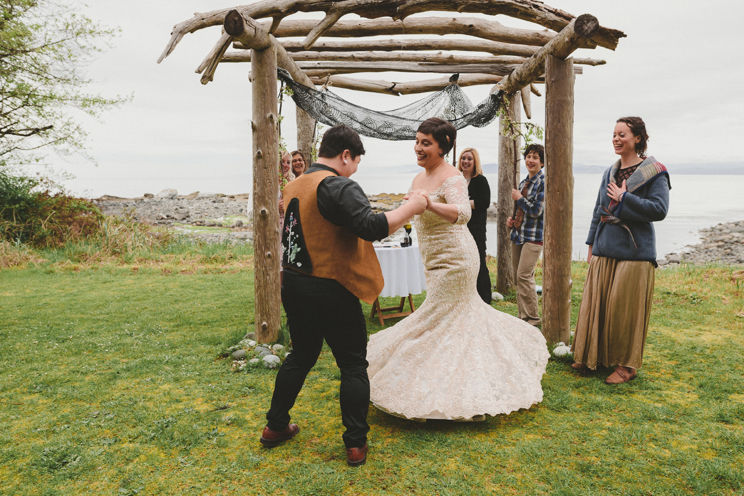 lgbtq jewish pagan metis wedding at sea breeze lodge on hornby island couple dancing