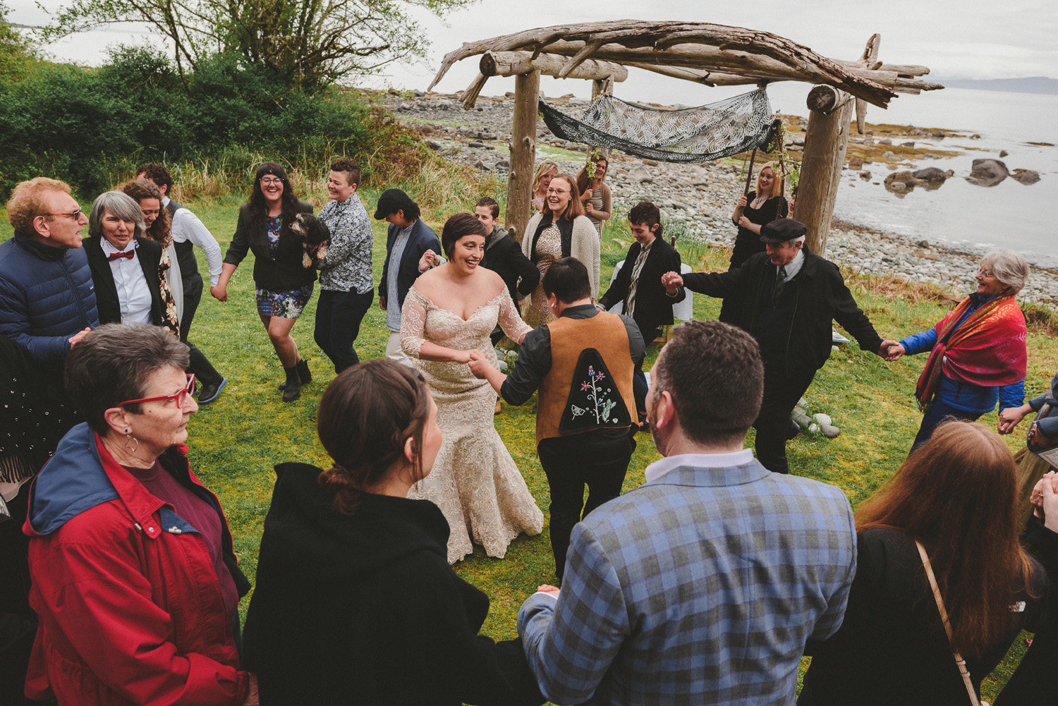 lgbtq jewish pagan metis wedding at sea breeze lodge on hornby island guests and couple dancing