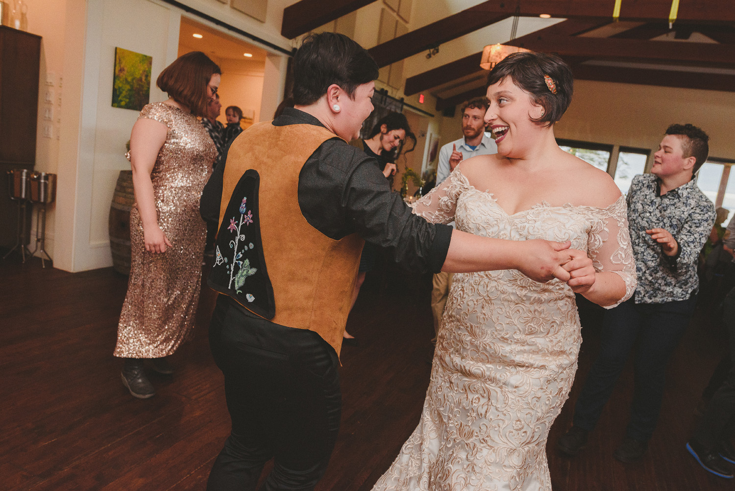 lgbtq jewish pagan metis wedding at sea breeze lodge on hornby island couple dancing