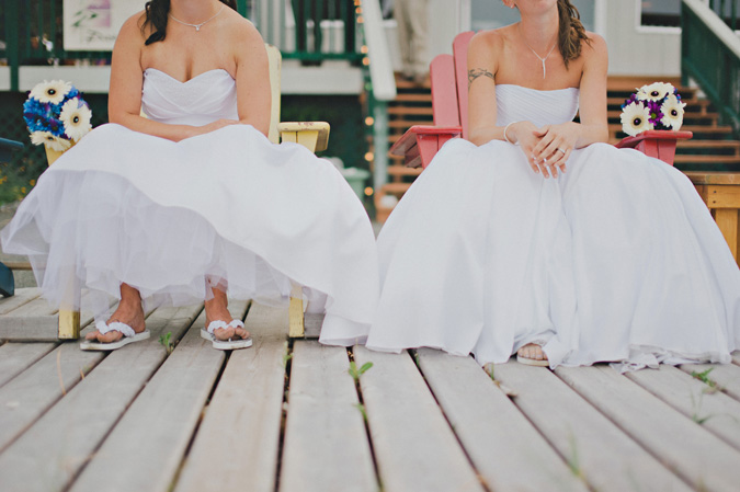 brides sitting on a deck