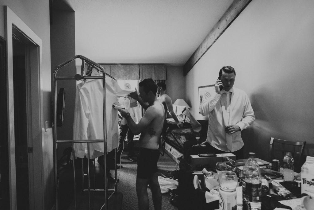 guys getting ready in a hotel room