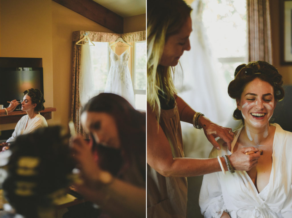 bride & friends getting make-up done in a hotel room