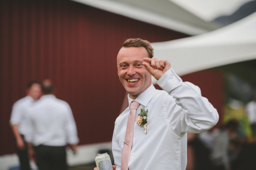 portrait of a man laughing at a wedding