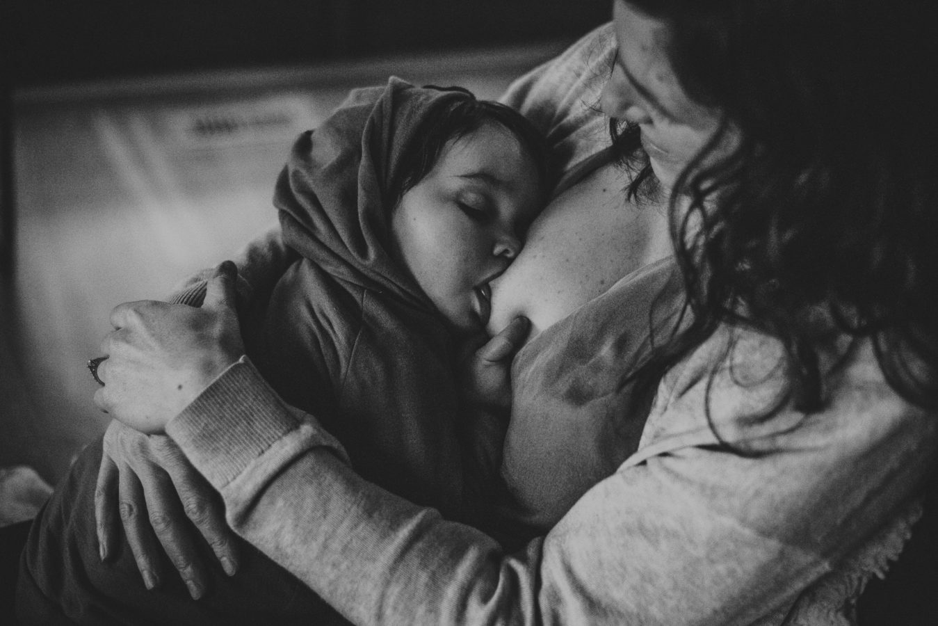 looking down on a mother breast feeding her baby