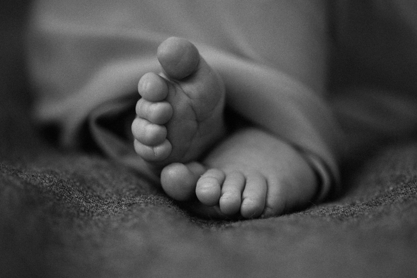 close up of a baby's toes