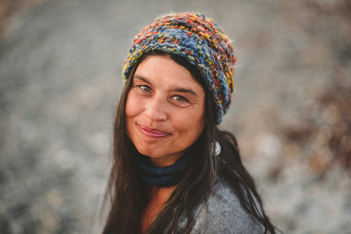 beautiful woman looking up at the camera smiling